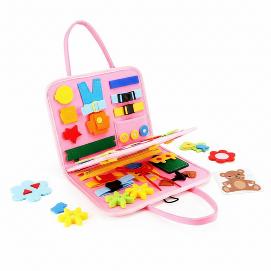 Pink children's educational toy set with colorful shapes and puzzles on a white background