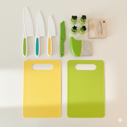 Set of kitchen utensils including knives, cutting boards, and small tools on a light background