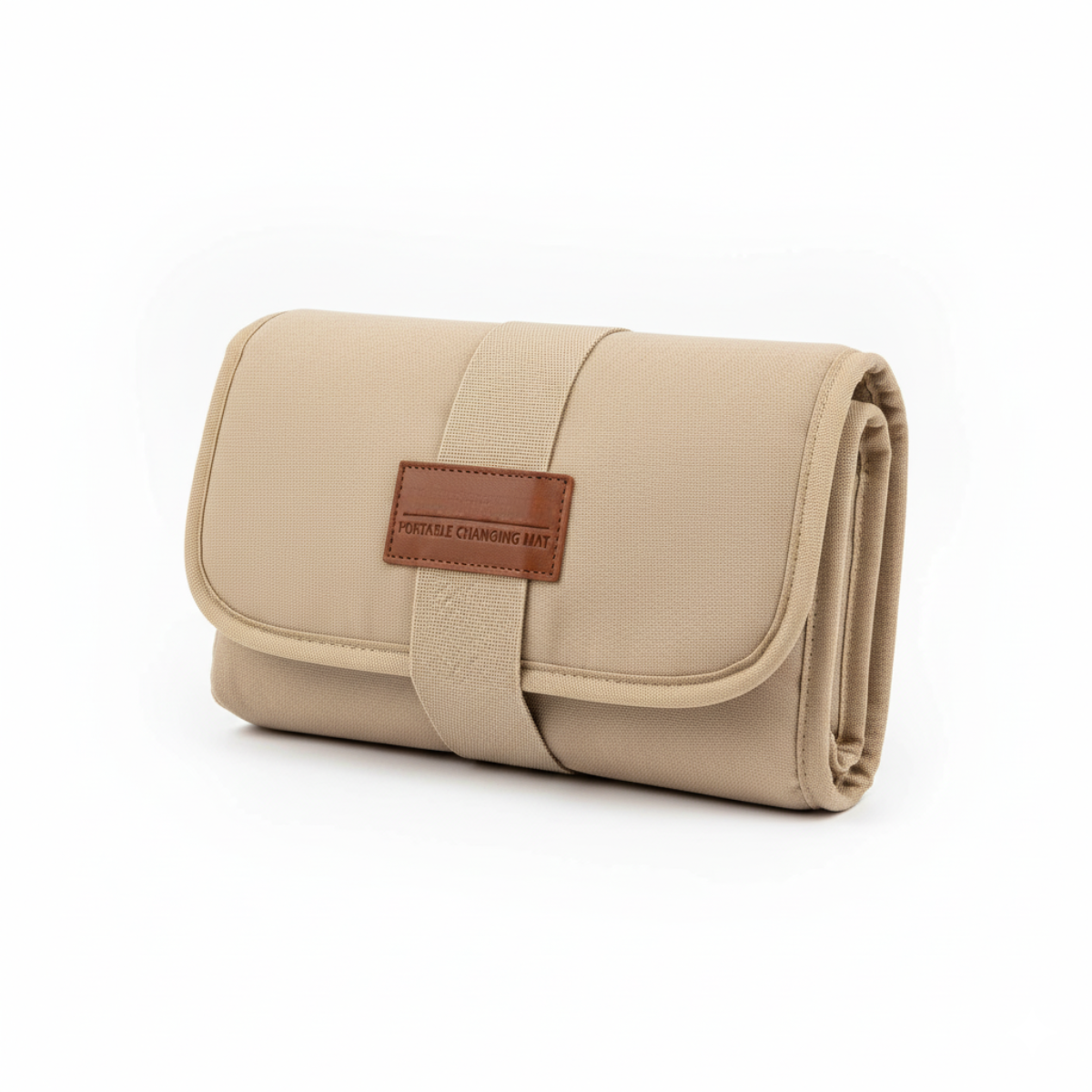 Beige portable changing mat with brown leather patch on a white background