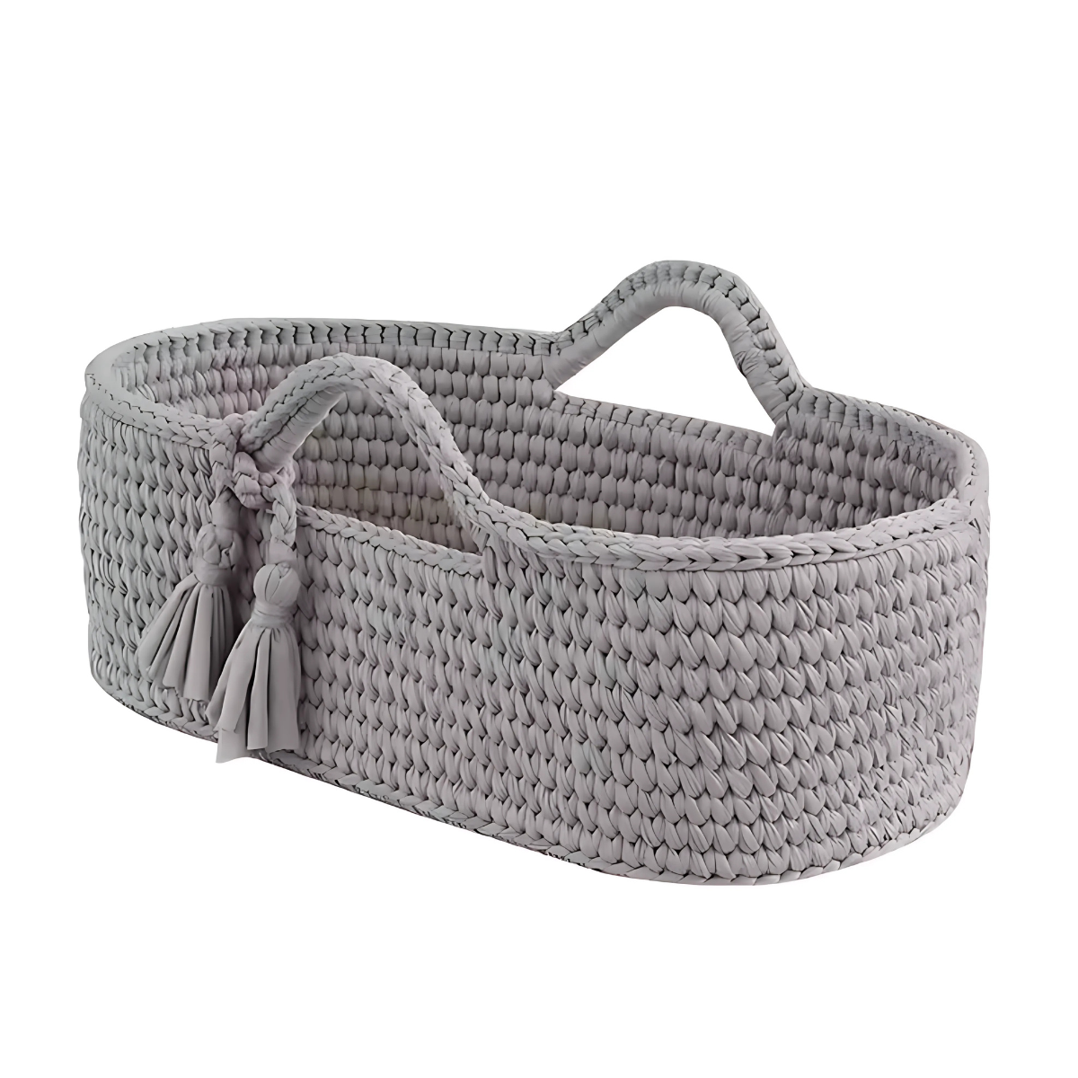 Gray woven basket with handles and tassels on a white background